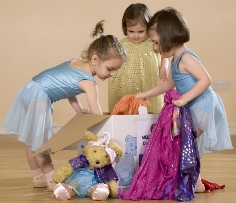 Dancers with a dressing-up box