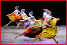 Photo of Jill Bridger teaching preschool babyballet dancers