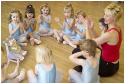 Photo of Jill Bridger and her Melody Movement dancers clapping