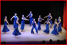 Photo of Jill Bridger teaching preschool babyballet dancers